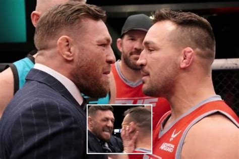 Conor McGregor SHOVES Michael Chandler during .